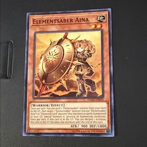 Elementsaber Aina Trading Card - Brown/Gold